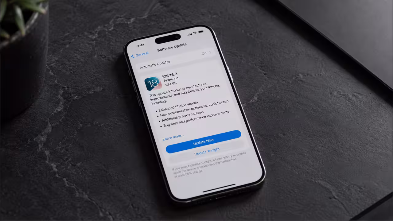 Titanium iPhone displaying the iOS Software Update settings screen for the critical 273-vulnerability security patch